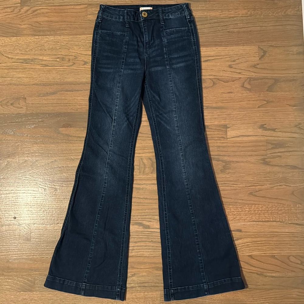Woman’s high rise wide leg cuffed denim jeans